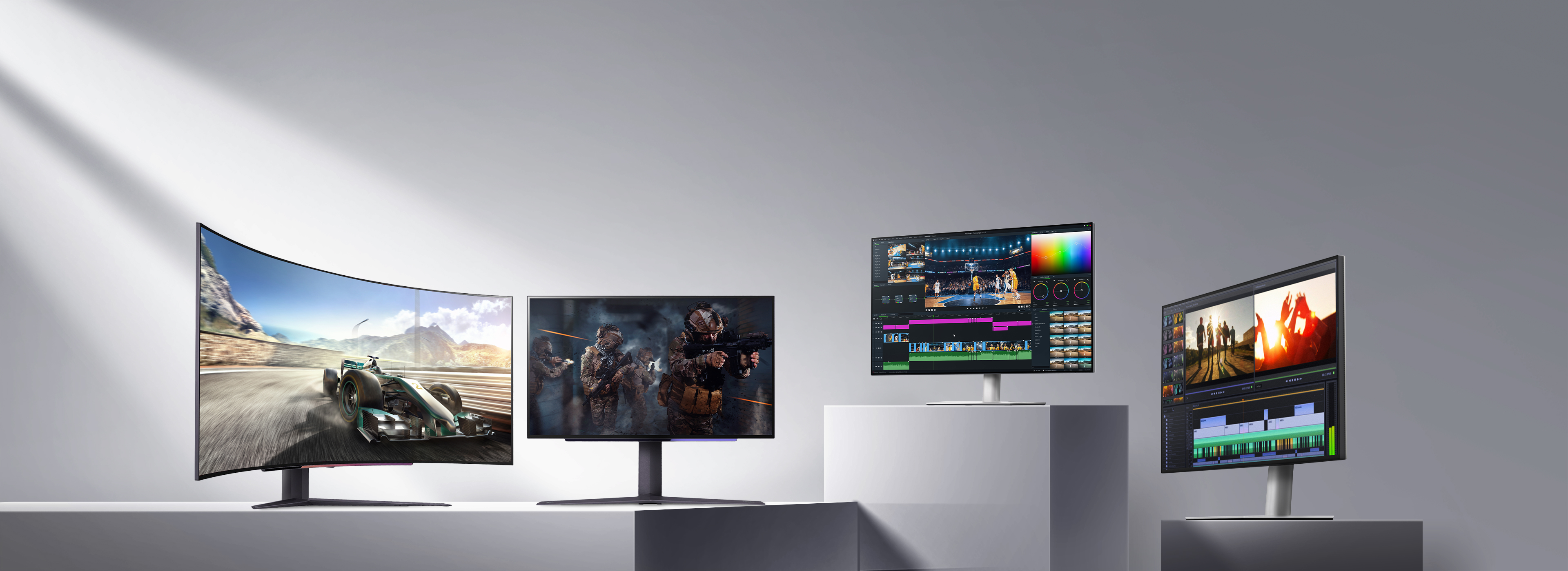 Four LG Display monitors showcasing different uses: from left to right, a racing game, a first-person shooter, video editing, and color grading. Highlights include powerful gaming performance and vivid color expression for creators.